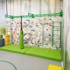Sensory Climbing Wall With Monkey Bars & Graphic Wallpaper