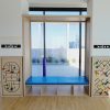 Window Seating With Open Shelving & Soft Seating