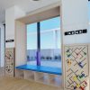 Window Seating With Open Shelving & Soft Seating