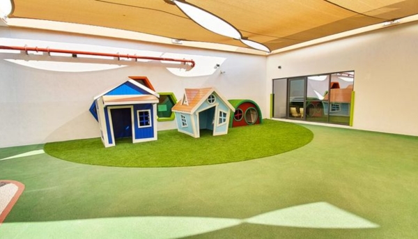 Artificial grass flooring