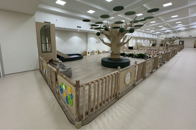 Large modern nursery interior play space designed and built by Moon Kids